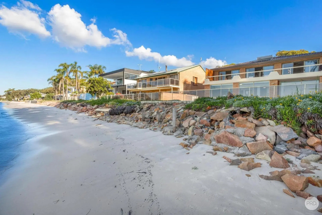 Seaside Sanctuary - Waterfront Luxury Home with Heated Pool