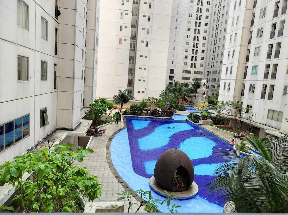 Toptravel Bassura City