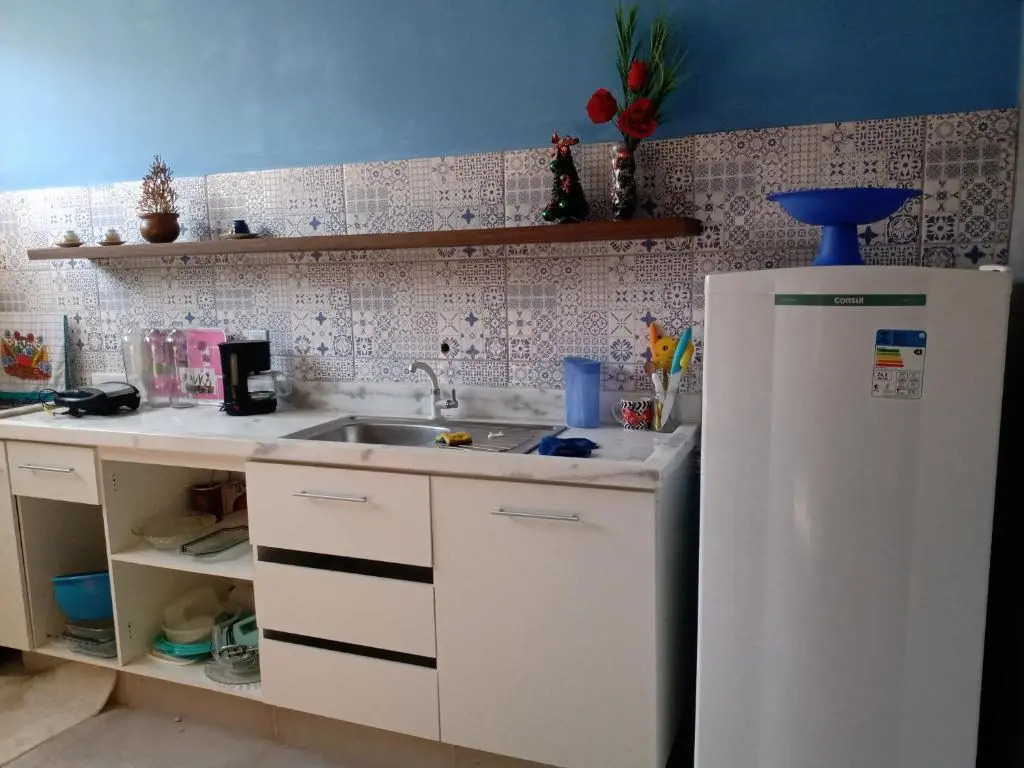 Casa conceito aberto aconchegante, perto de tudo e com garagem 64m2