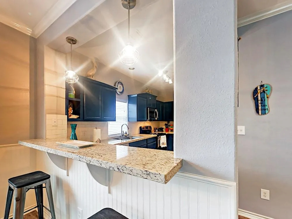 Spacious Port A Condo with Pool Views by RedAwning