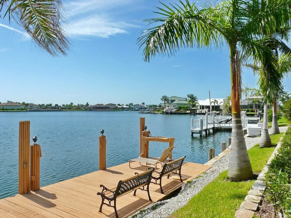 Waterfront home with views, pool and walk to beach