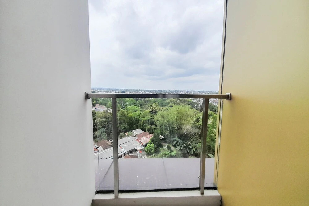 Elegant and Spacious 1BR at Patraland Amarta Apartment By Travelio