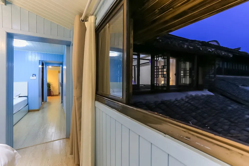 Wu Town Sijing Bieyuan Boutique Hostel
