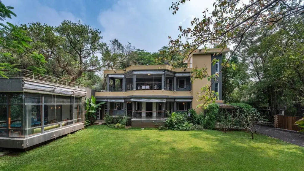 SaffronStays Odeon - 4BR heritage art deco villa with cantilever pool, verandahs & forested lawns