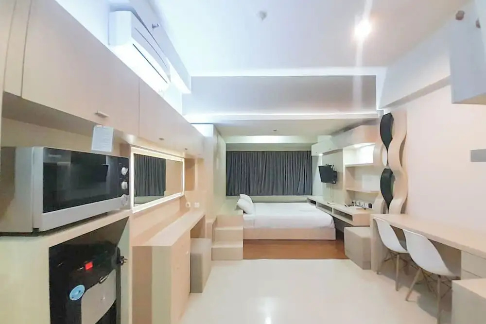 Best Homey and Modern Studio at Uttara The Icon Apartment By Travelio