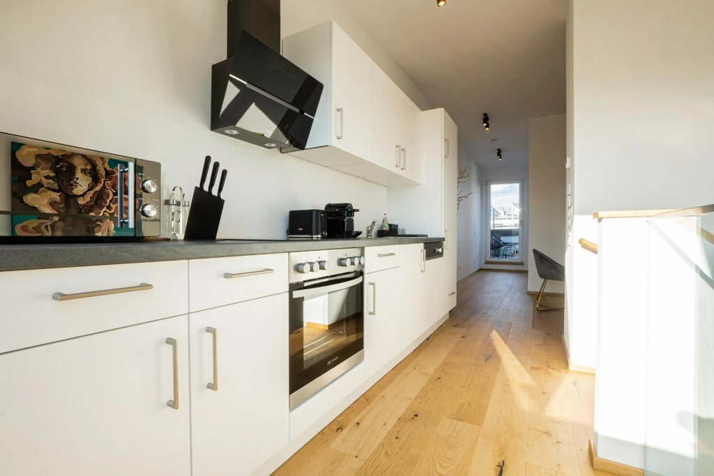 2-story penthouse with designer renovation for 2 people. A 15-minute walk to the city center