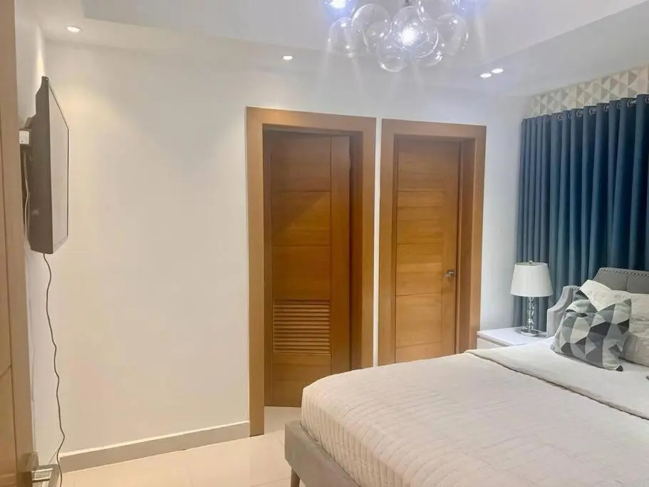 1BR modern centric apartment Pool, gym, rooftop Santo Domingo