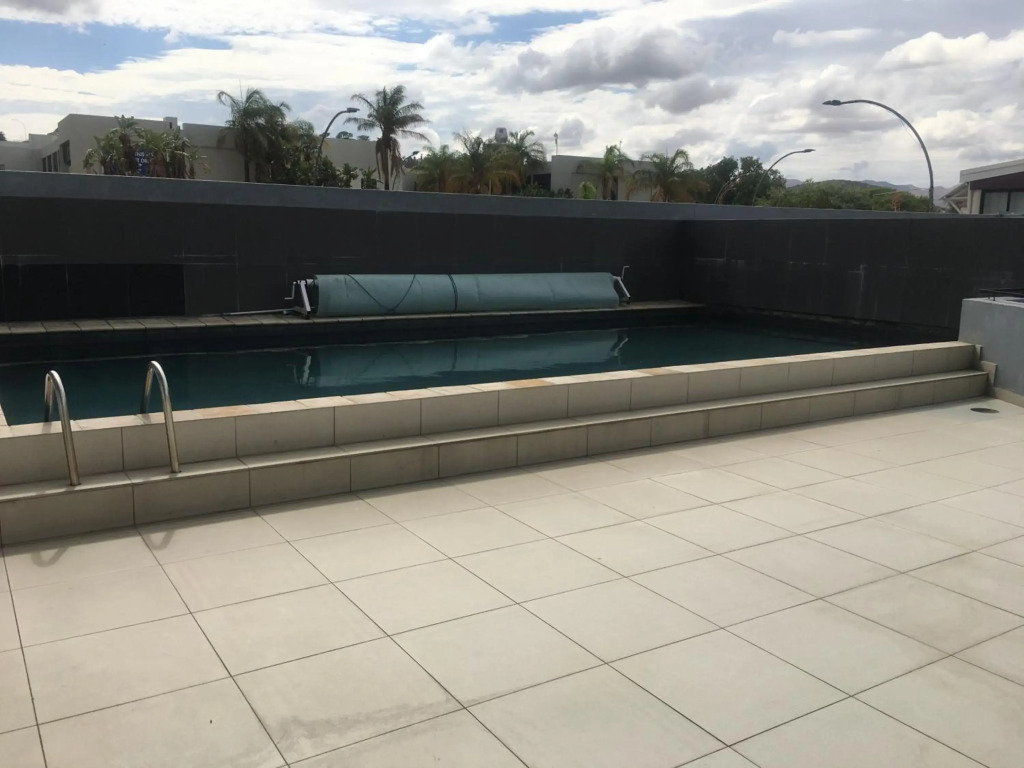 Highrise Windhoek apartment with skyline view, pool and gym