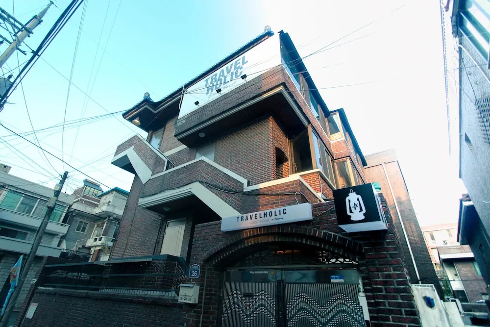 Travelholic Guesthouse - Hostel