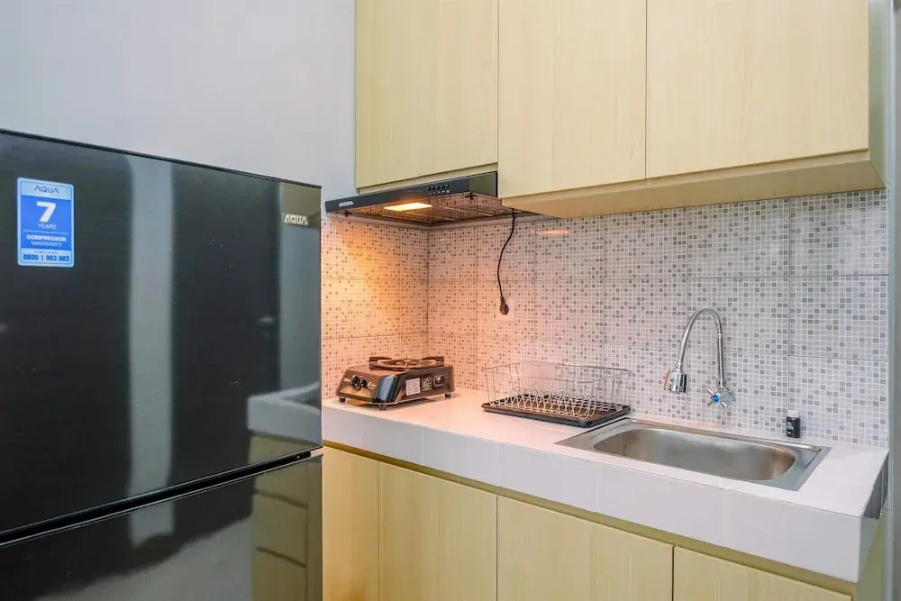 Elegant and Comfort 2BR at Royal Heights Apartment