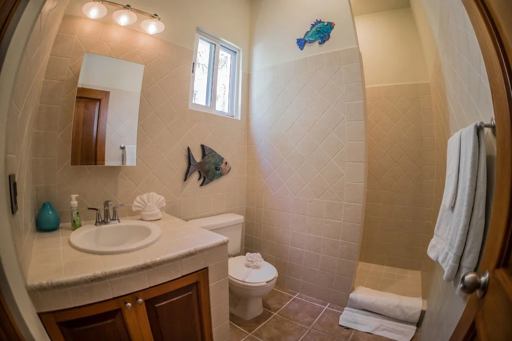 Romanina 1 Condo in the Heart of Playa del Carmen by RedAwning