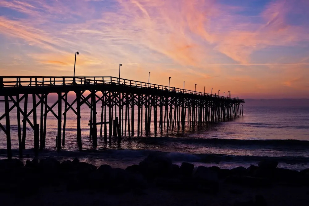 New Listing! Coastal Gem W/ Balconies, Near Beach 4 Bedroom Duplex