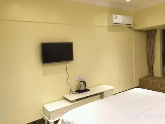 City Xinjia Apartment Hotel