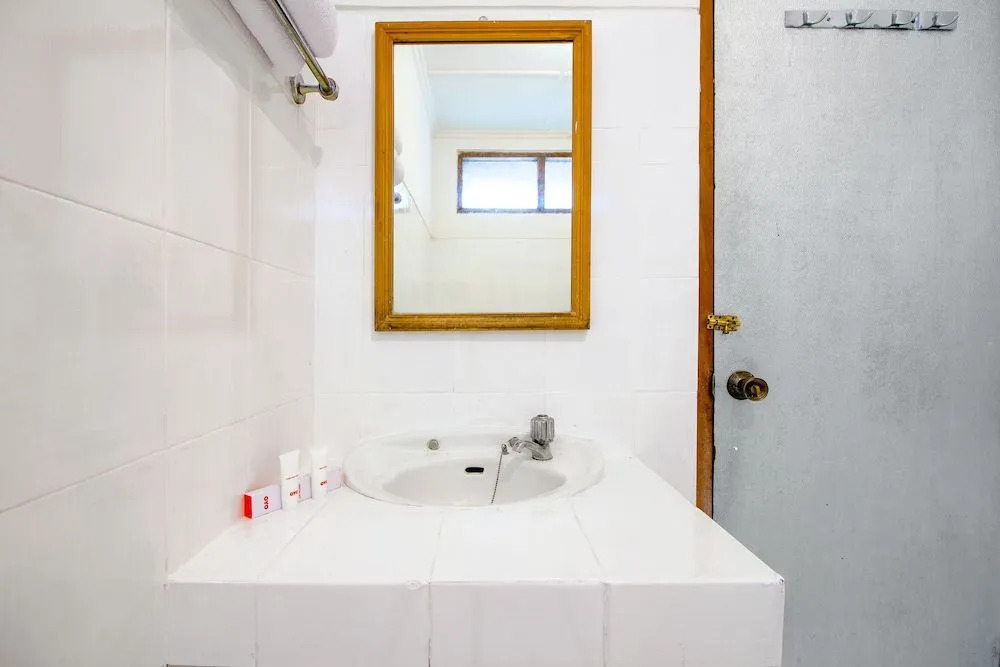 Oyo 1602 Trim Tiga Hotel
