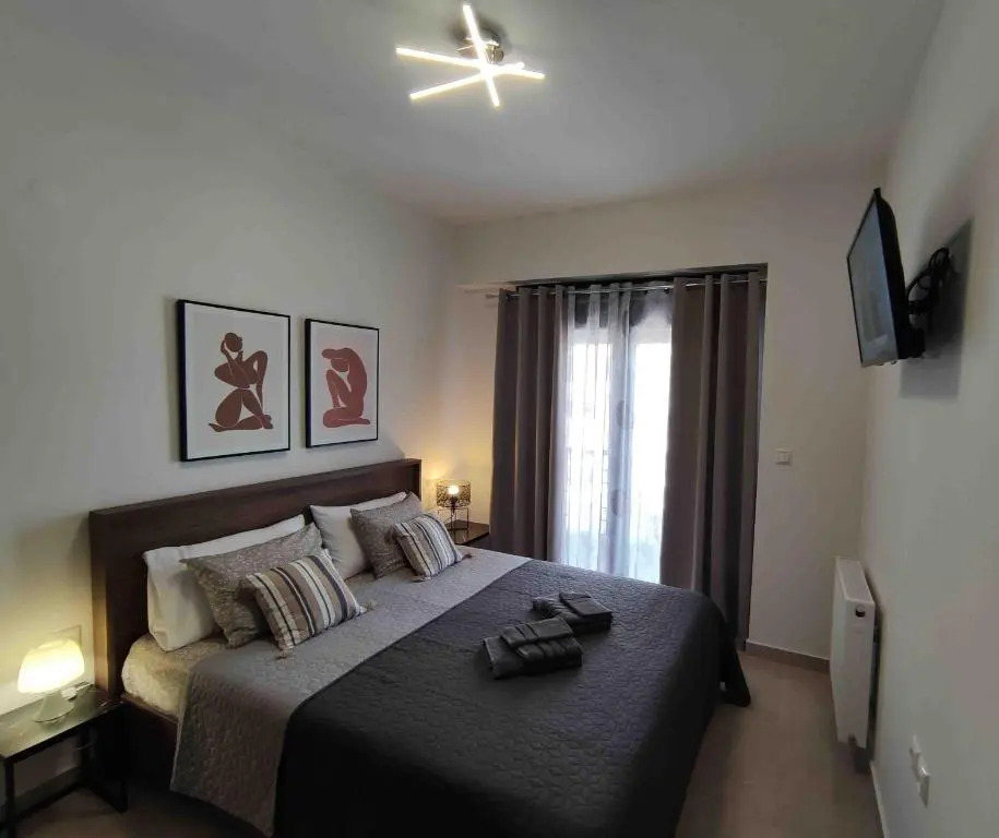 Grey Swan - Modern & Stylish apartment with Private Parking