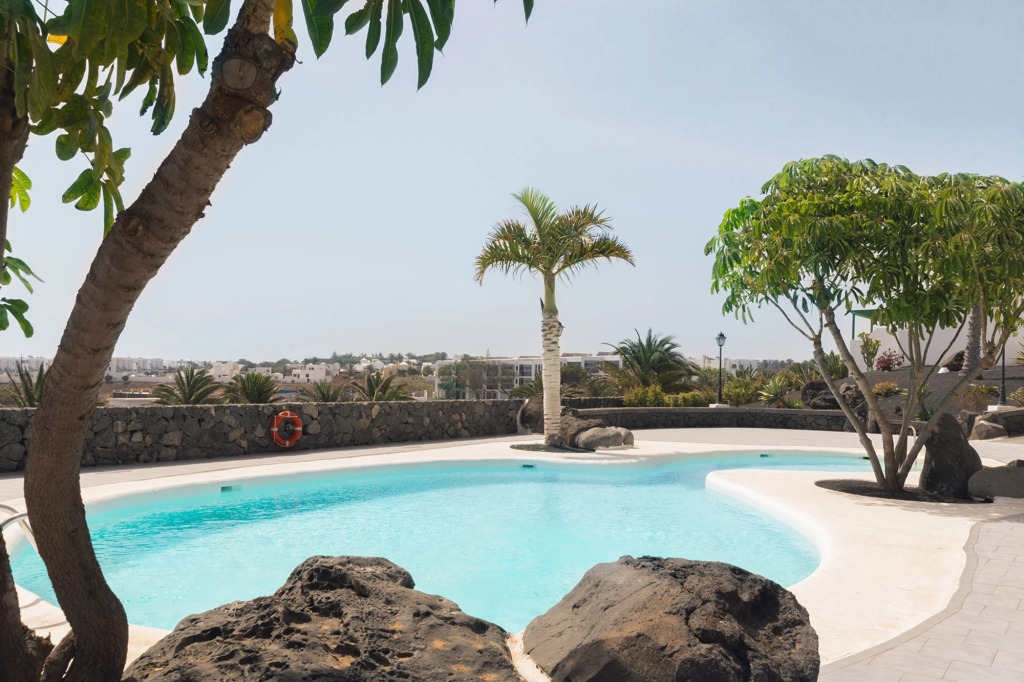 Apartamento OM con piscina y vistas al mar