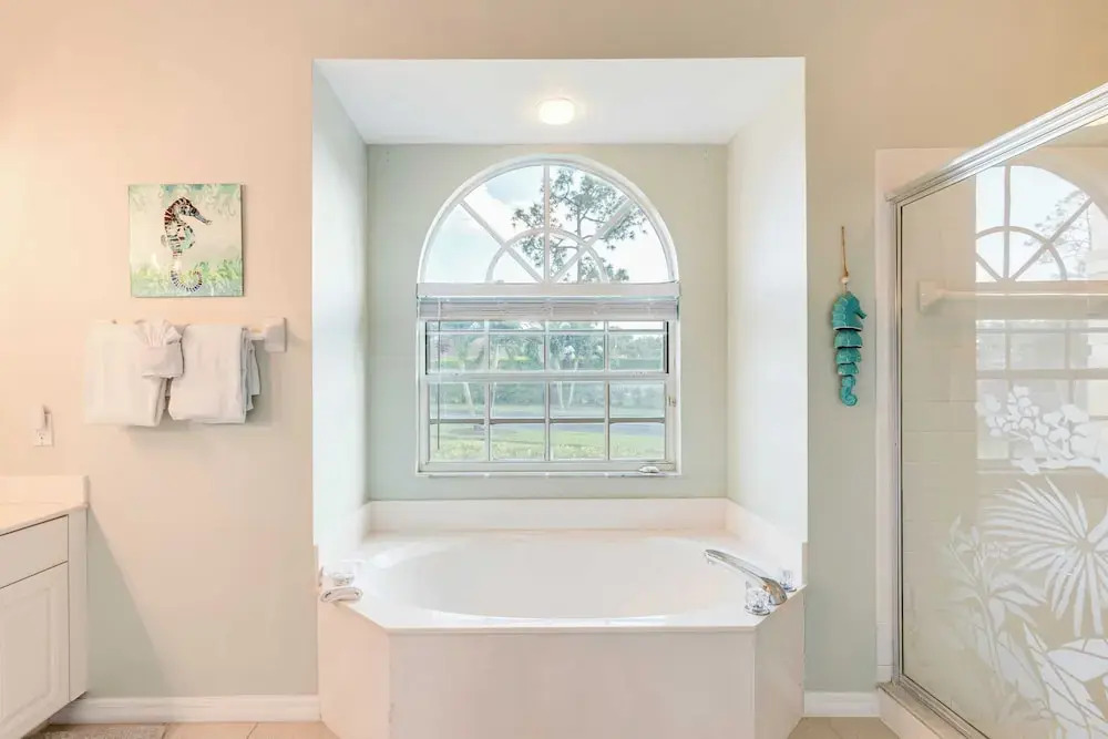 Private Pool, Pond Views, & Bonus Lounge in Gated Naples Community Drive to Dining & Sand