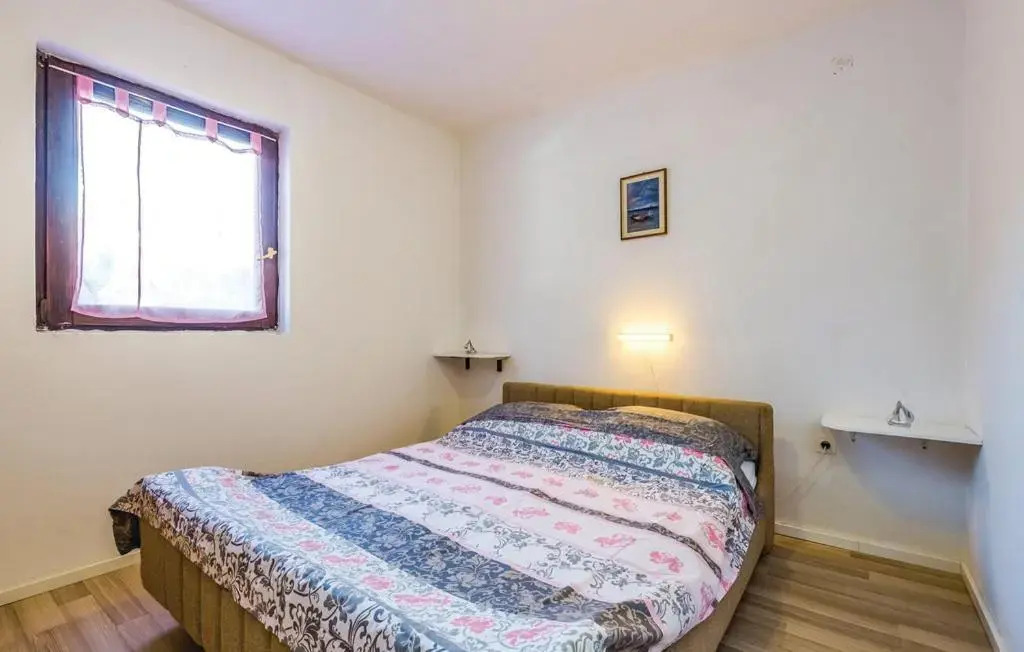 Three-Bedroom Apartment Jadranovo with an Outdoor Swimming Pool 08