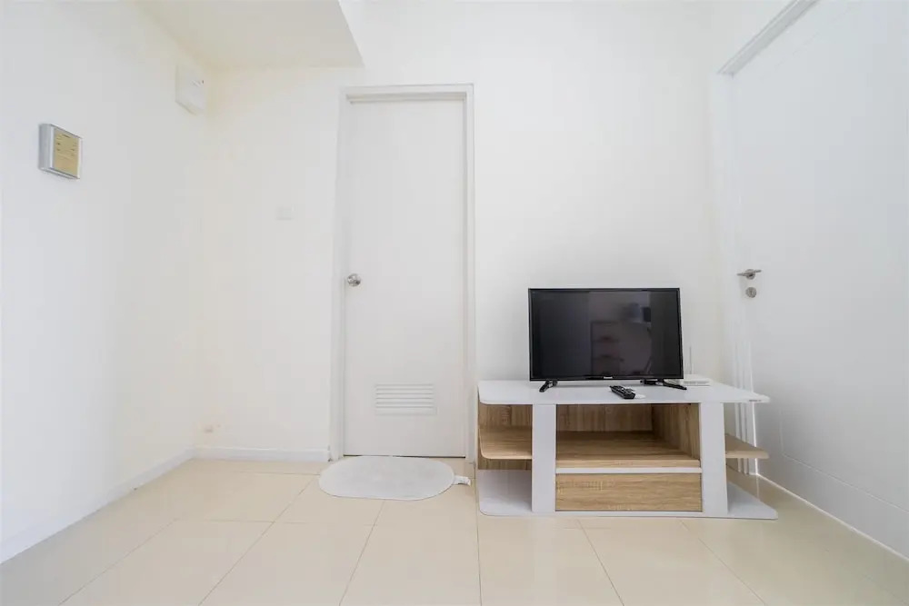 Minimalist Apartment with Sofa Bed at Parahyangan Residence
