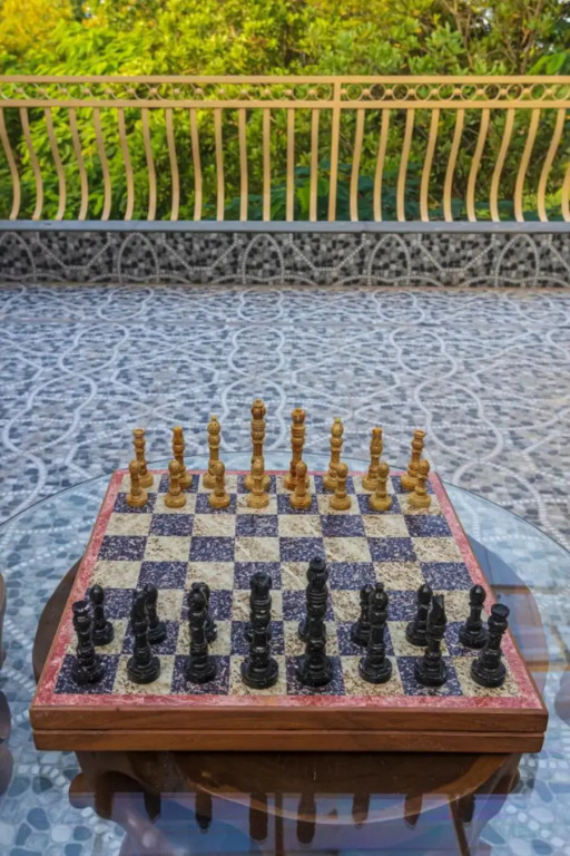 SaffronStays Aura, 4 BR Luxury Pool Villa with Game Room & Lawn