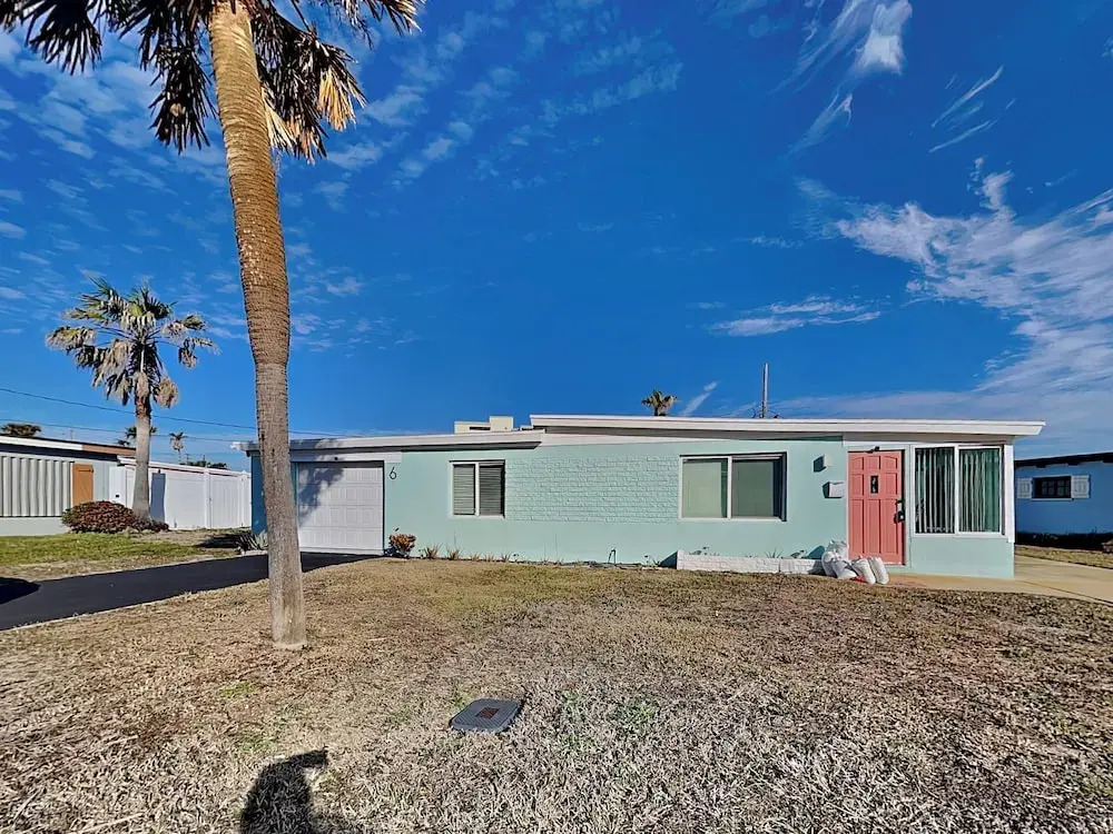Bathing Suit Beach Bungalow by Distinctive Beach Rentals