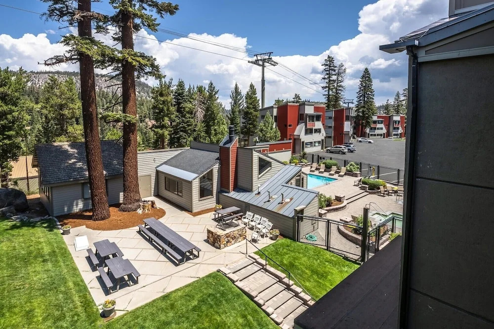 DELUXE SLOPESIDE Condo with 4th FLOOR VIEWS, Elevator and Underground Parking at Canyon Lodge (1849 Condos 409) by RedAwning