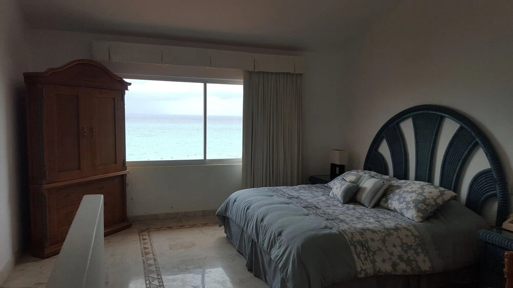 Luxury Beachfront Condo in Royal Sunset Fishermens Resort spa
