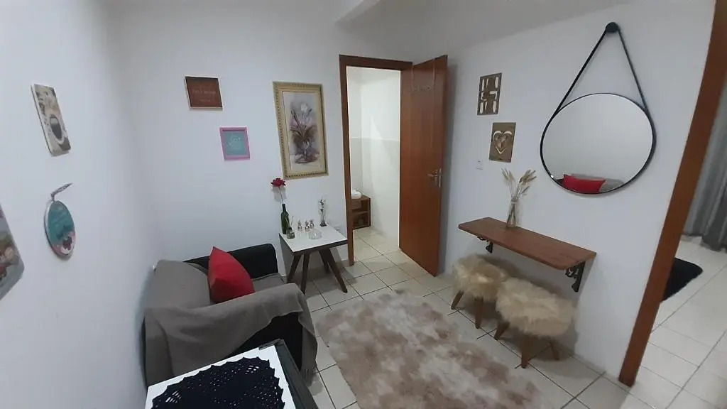 Suite climatizada, ao lado da praca principal