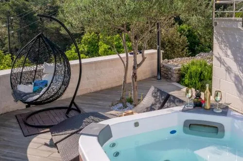 Uniquely designed Villa Ivana with outdoor Jacuzzi nearby the pebble Banje beach at the Island of Solta