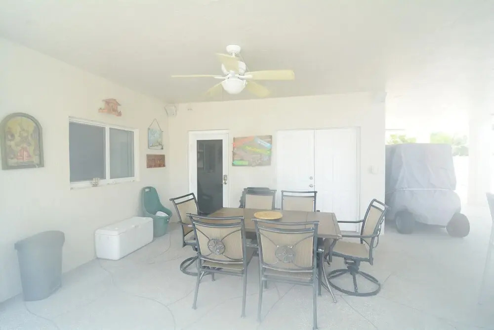 Beautiful Canal Front Home With Above Ground Pool, Dock And Fish Cleaning Station 4 Bedroom Home by RedAwning