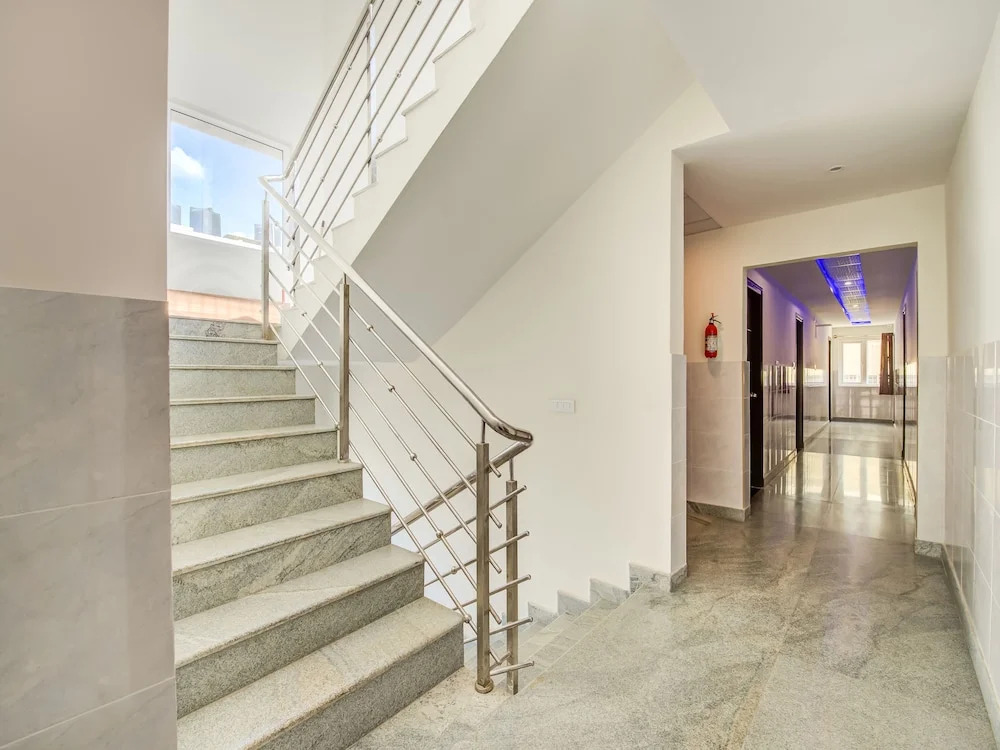 Capital O 19360 Sai Suites Inn