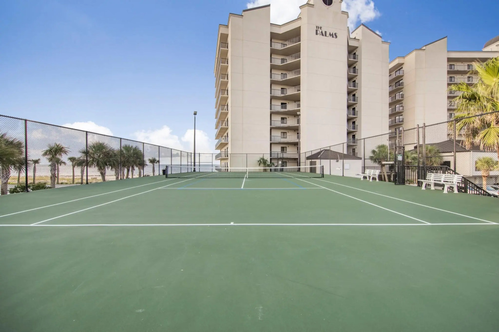 Beachfront condo with wraparound balcony & pools