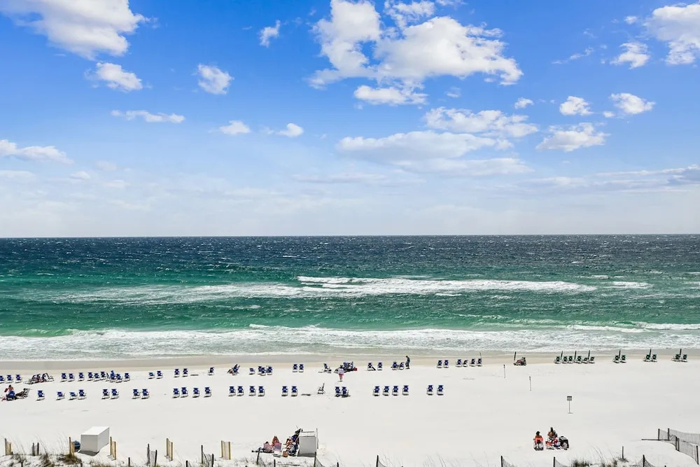 Silver Beach 506 is a gorgeous Gulf Front 4 BR with free beach service - sleeps 8 by RedAwning