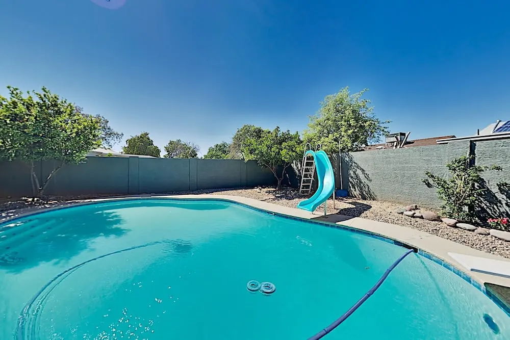 Family Friendly W/ Heated Pool & Waterslide 4 Bedroom Home