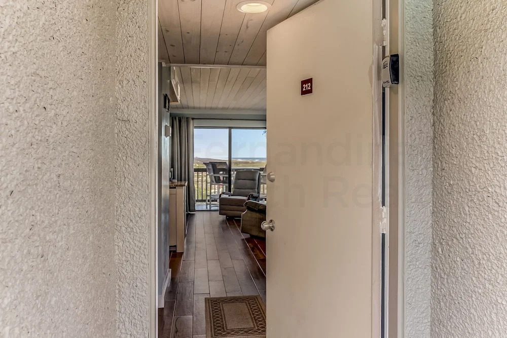 Newly Remodeled Oceanfront Condo with Salt Water Pool and Private Walkway to Beach by RedAwning