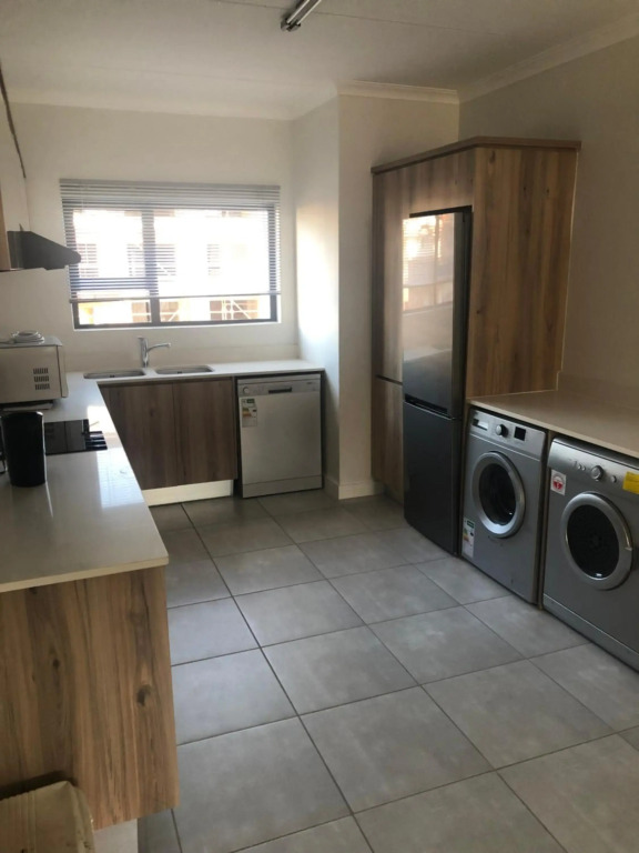 A Coastal/island experience at a Large 2 bed apartment at a Crystal Lagoon Estate