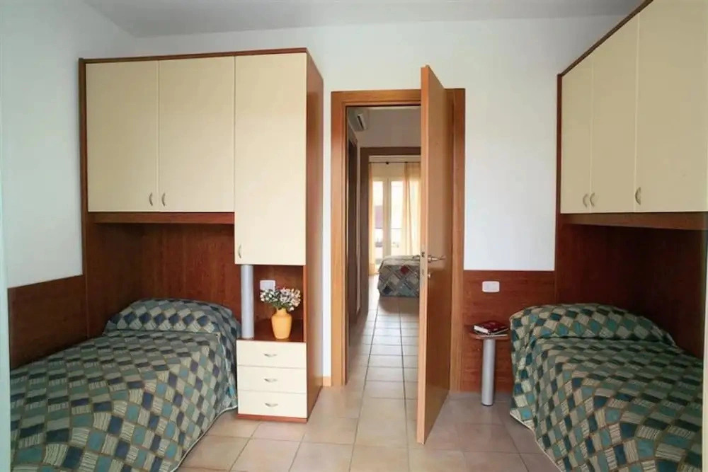 Three-storey Apartment With Shared Pool and Patio