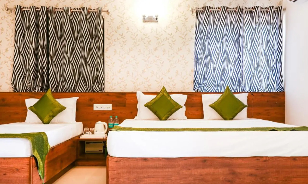 Treebo Comforts Inn, University Road Deralakatte