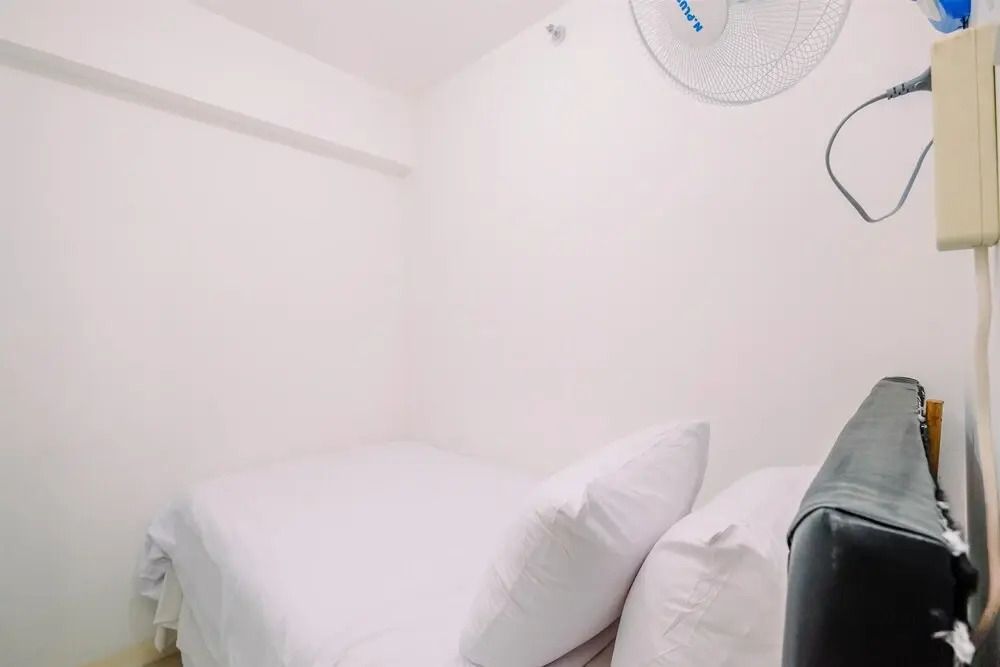Alluring 2BR at Bassura City Apartment near Mall By Travelio