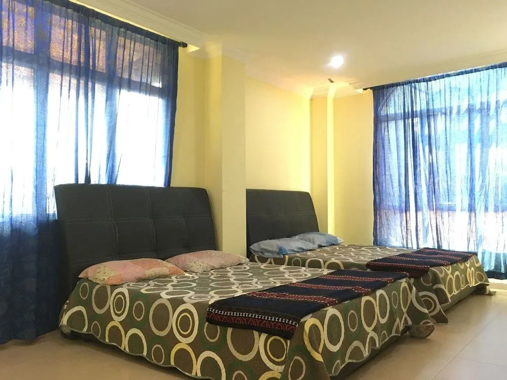 SPOT ON 89857 Azra Inn Rumah Tumpangan