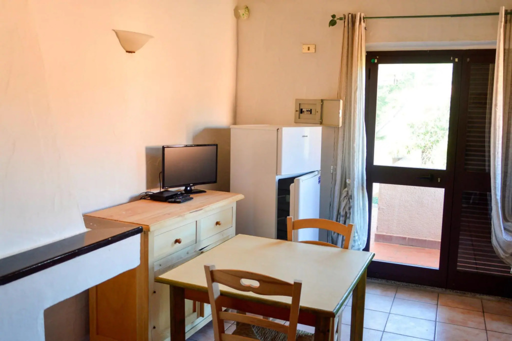 Apartment in Cannigione with garden