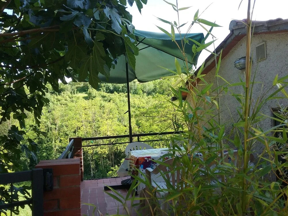 A Small House Immersed in the Green of the Tuscan Countryside
