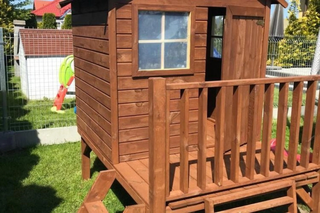 Half of holiday home, terrace, playground