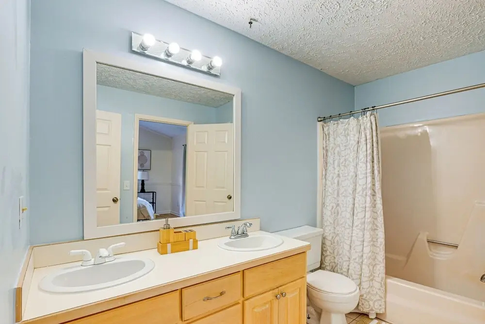 Porch, Yard & Creek Access: Spacious Sylva Home!
