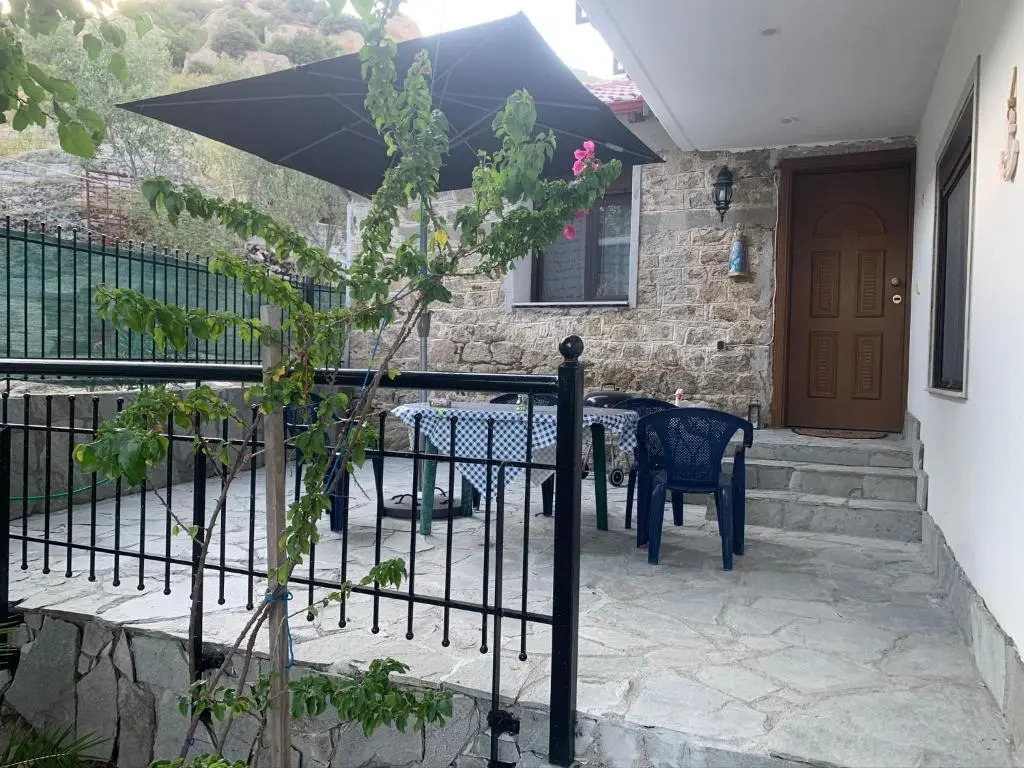 Stone house under a rock Kukos