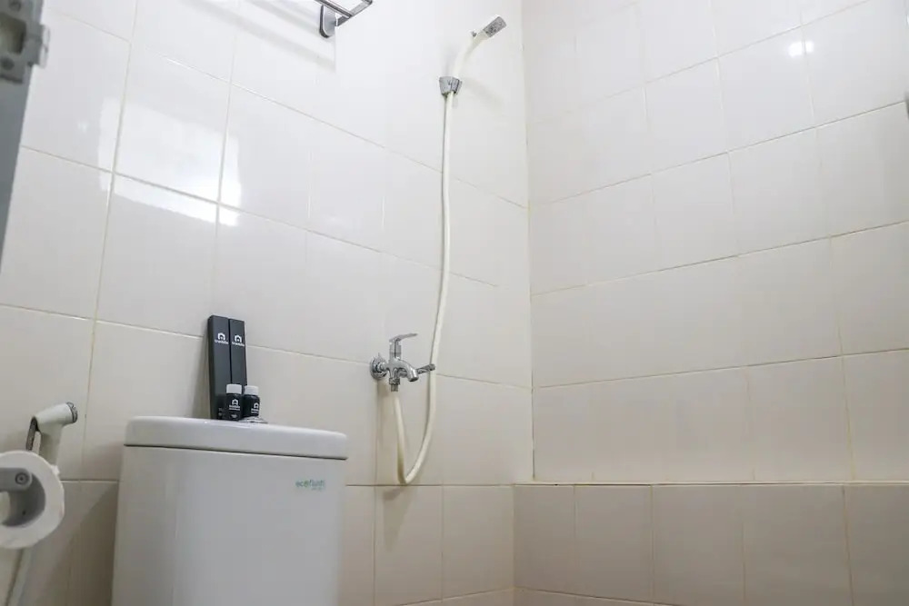 Cozy and Beautiful 2BR Bassura City Apartment By Travelio