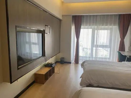 Gemini Hotel (Xinxiang Baolong Plaza)