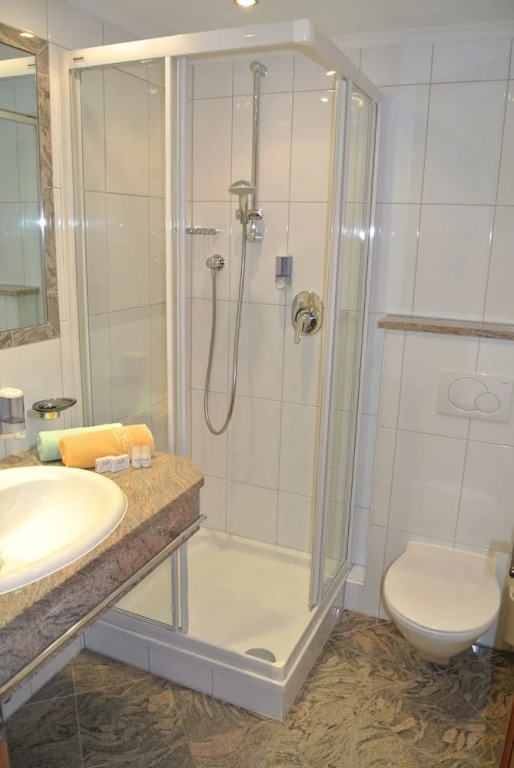 Hotel Garni Central - Zimmer - Studios - Apartments