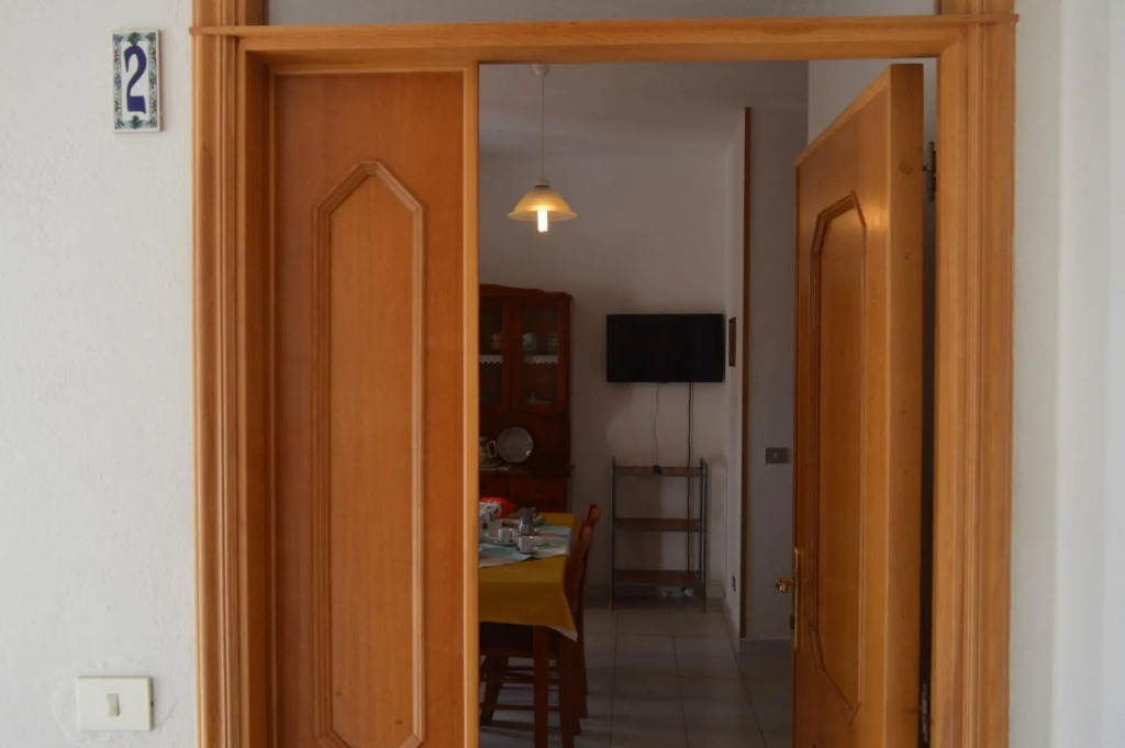 Holiday home surrounded by greenery 100 meters from the sea shore in the town of San Giovanni di Pos-Appartamento Aeres