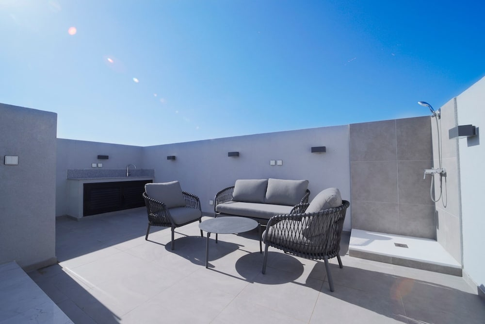 Rooftop Sunset Garden by Staycom
